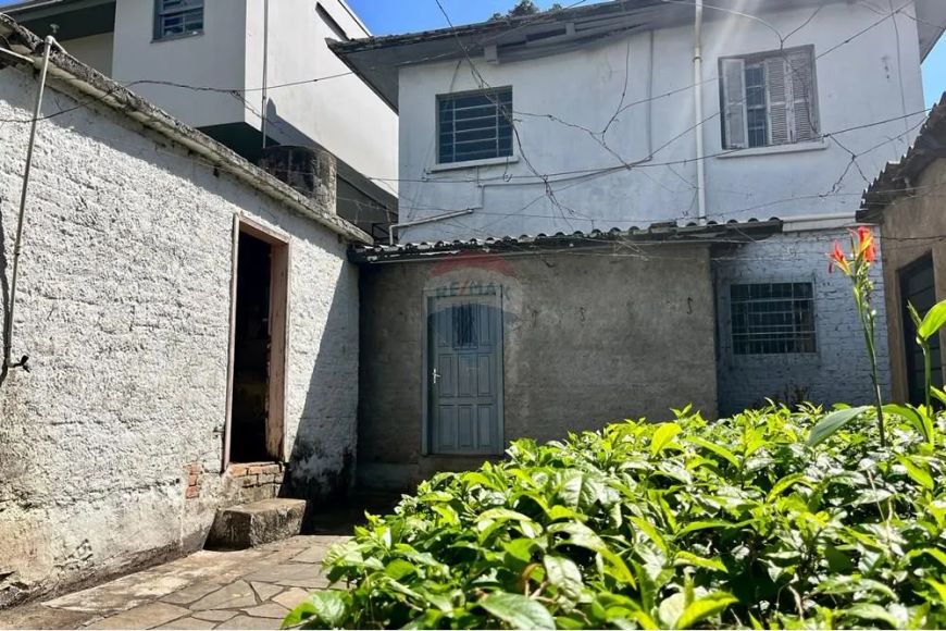 Terreno com casa em localização privilegiada para ponto comercial