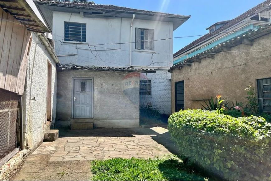 Terreno com casa em localização privilegiada para ponto comercial