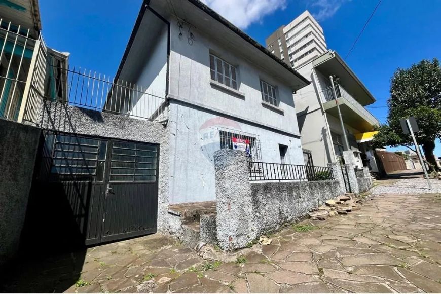 Terreno com casa em localização privilegiada para ponto comercial