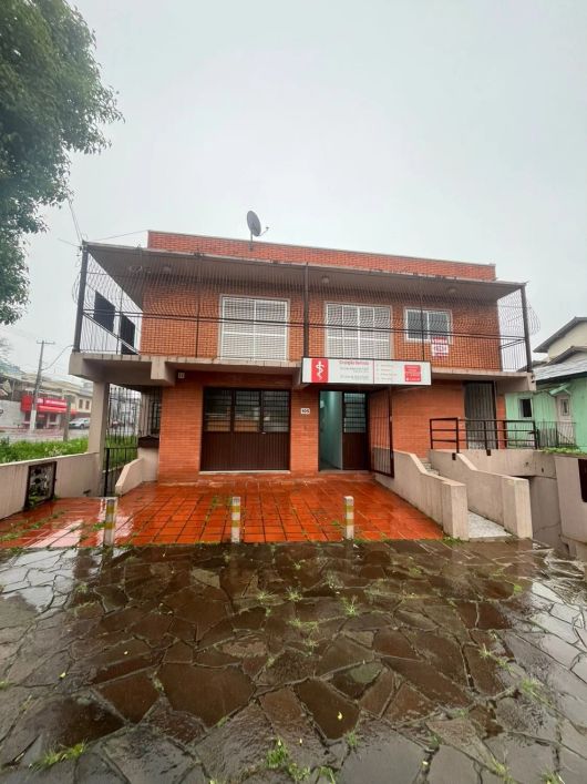 Ótimo terreno com 02 casas no Bairro Salgado Filho! Conta com 03 dormitórios, sala para 02 ambientes