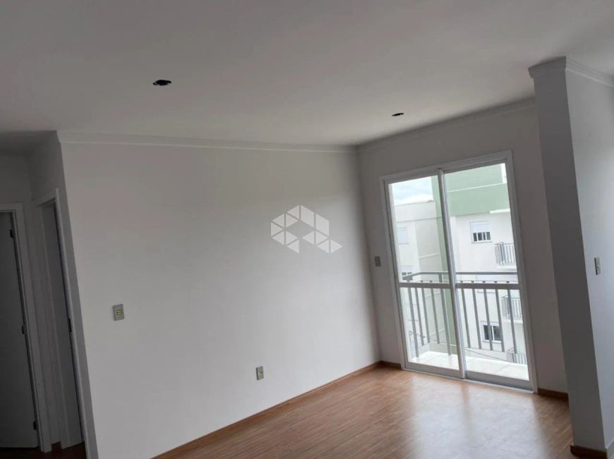 Apartamento à Venda no Bairro Santa Fé com 2 Dormitórios, sacada e vaga de Garagem coberta.