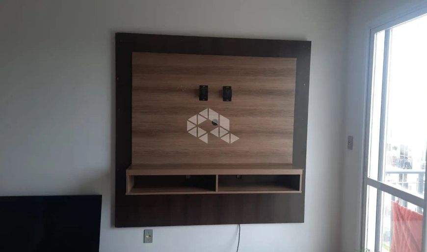 Apartamento à Venda no Bairro Santa Fé com 2 Dormitórios, sacada e vaga de Garagem coberta.
