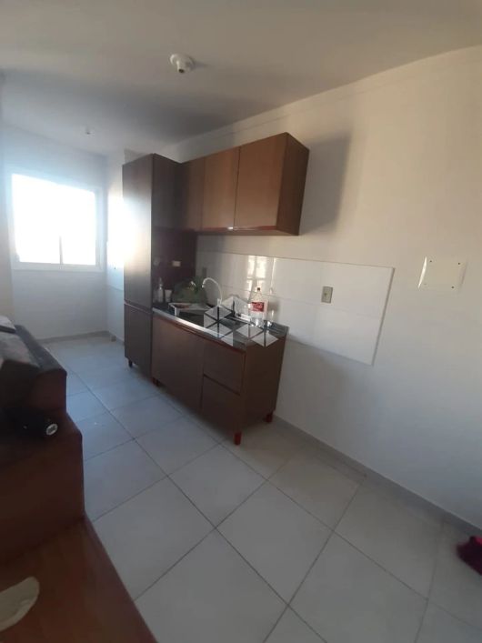 Apartamento à Venda no Bairro Santa Fé com 2 Dormitórios, sacada e vaga de Garagem coberta.