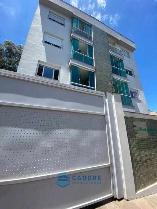 Apartamento dois dormitórios com suite e garagem