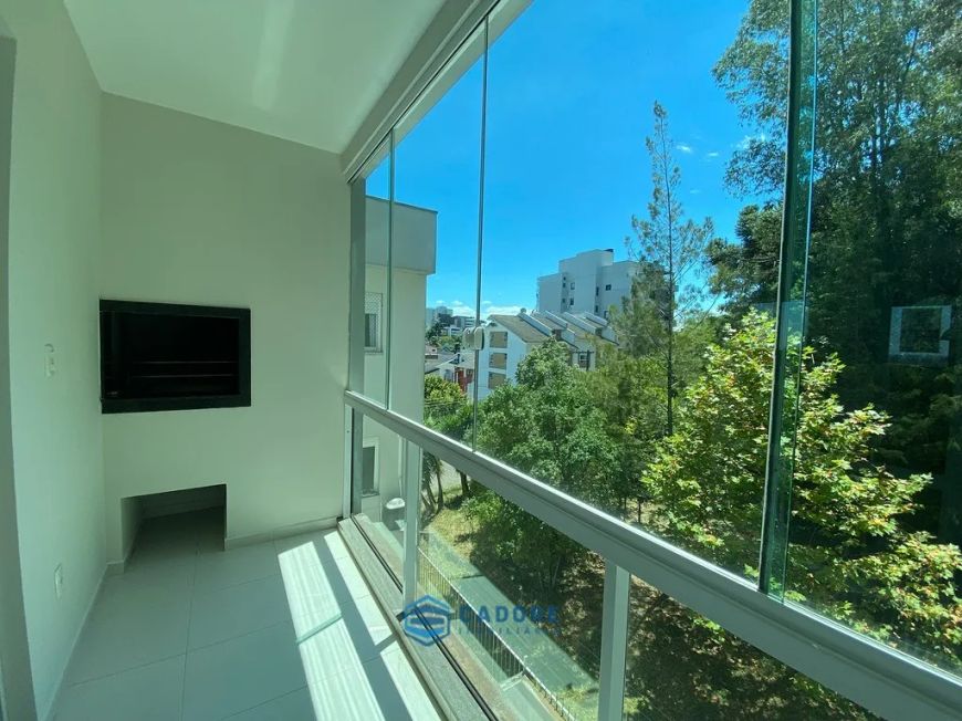 Apartamento dois dormitórios com suite e garagem