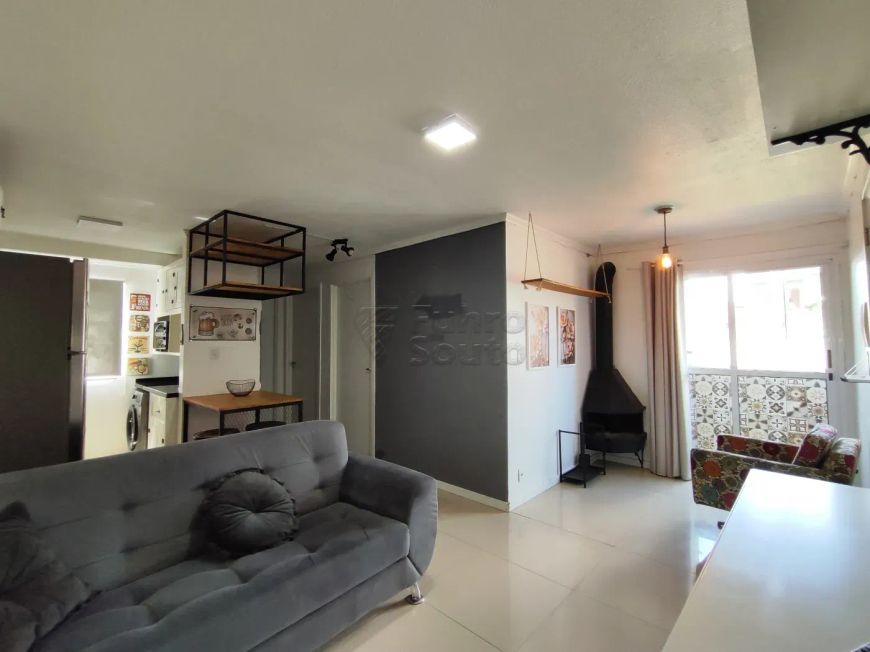 Apartamento a venda no Residencial das Flores, com 2 dormitórios e sacada com churrasqueira.