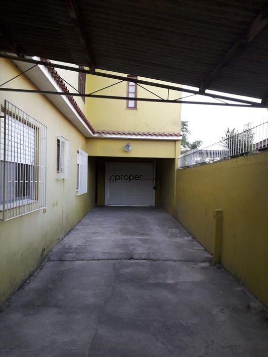 Terreno com duas casas próximo a Av Duque