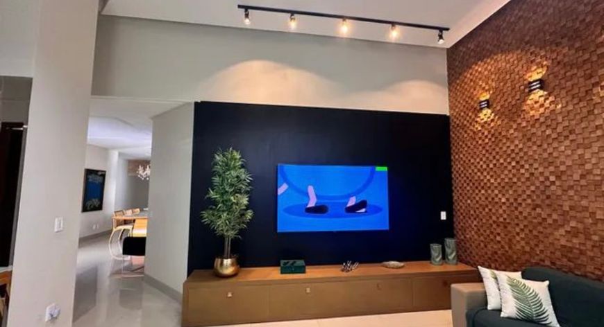 Casa de condomínio térrea para venda tem 256 metros quadrados com 4 quartos