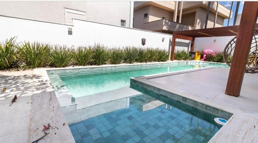 Casa de condomínio para venda com 325 metros quadrados com 5 quartos