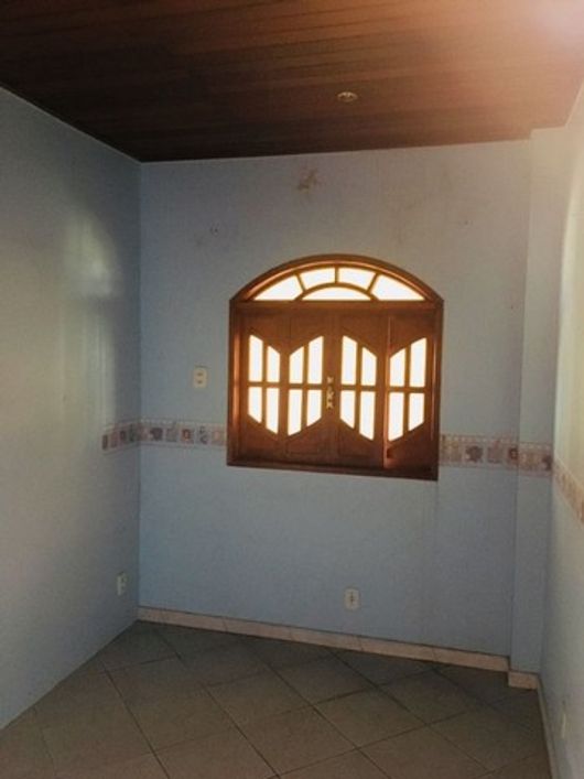 Casa com quintal em Jardim Olimpo.