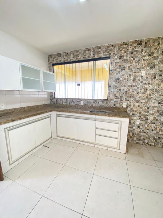 Bela casa com quintal em Chácara Arcampo