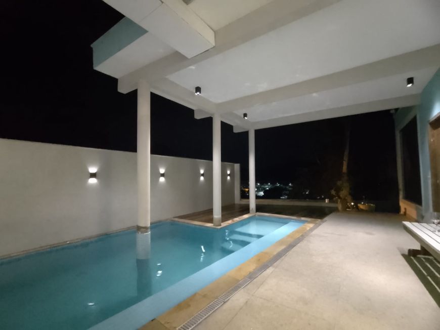 Casa de condomínio para venda possui 200 metros quadrados com 4 quartos
