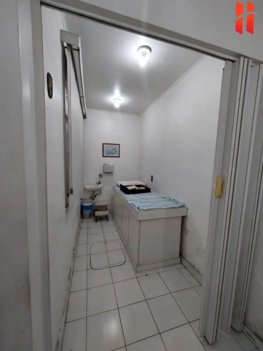 Prédio com apartamentos e salas comerciais à venda, 270 m² por R$ 1.100.000 - Centro - Duque de Caxi