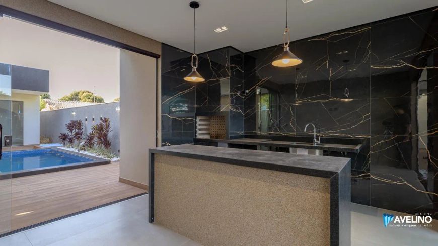 Com 3 suítes espaço gourmet e piscina