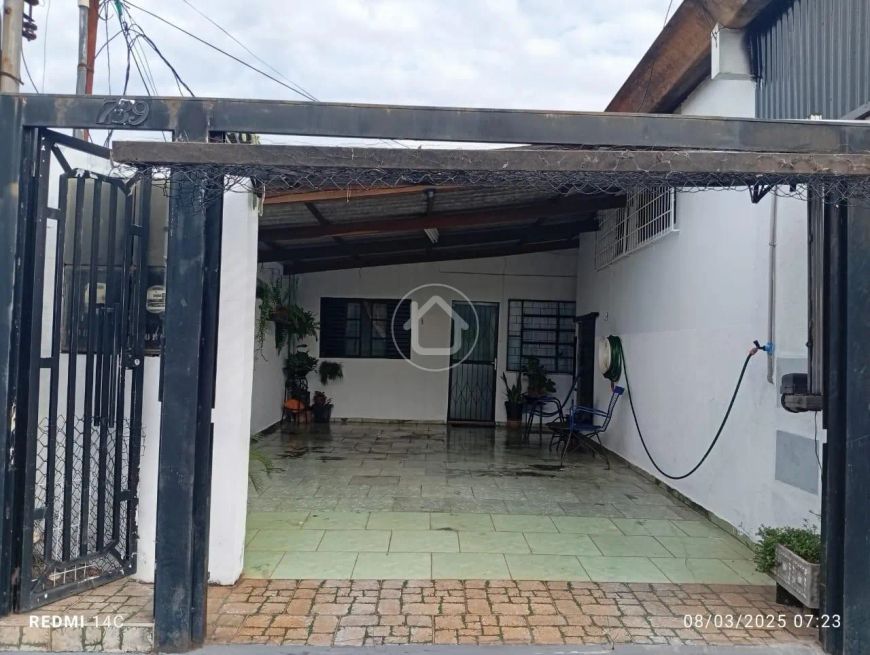 CASA COM PONTO COMERCIAL