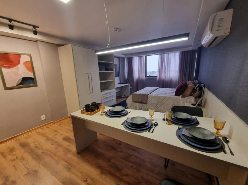 Flat Suíte Confortável com Cama Queen e Cozinha Americana