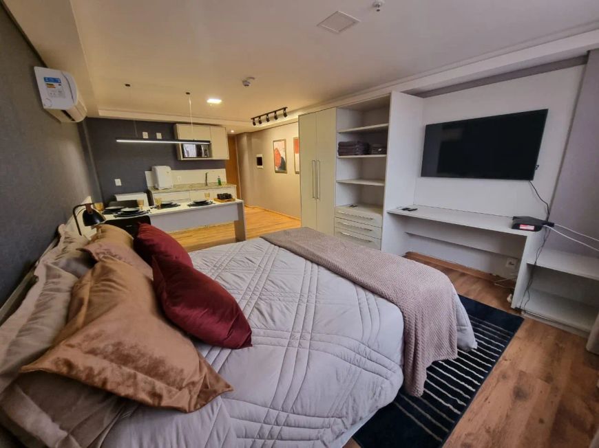 Flat Suíte Confortável com Cama Queen e Cozinha Americana