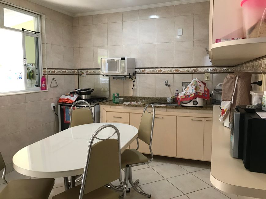 Vendo casa excelente com 4 quartos sendo 2 suítes e 2 vagas de garagem california Nova Iguaçu