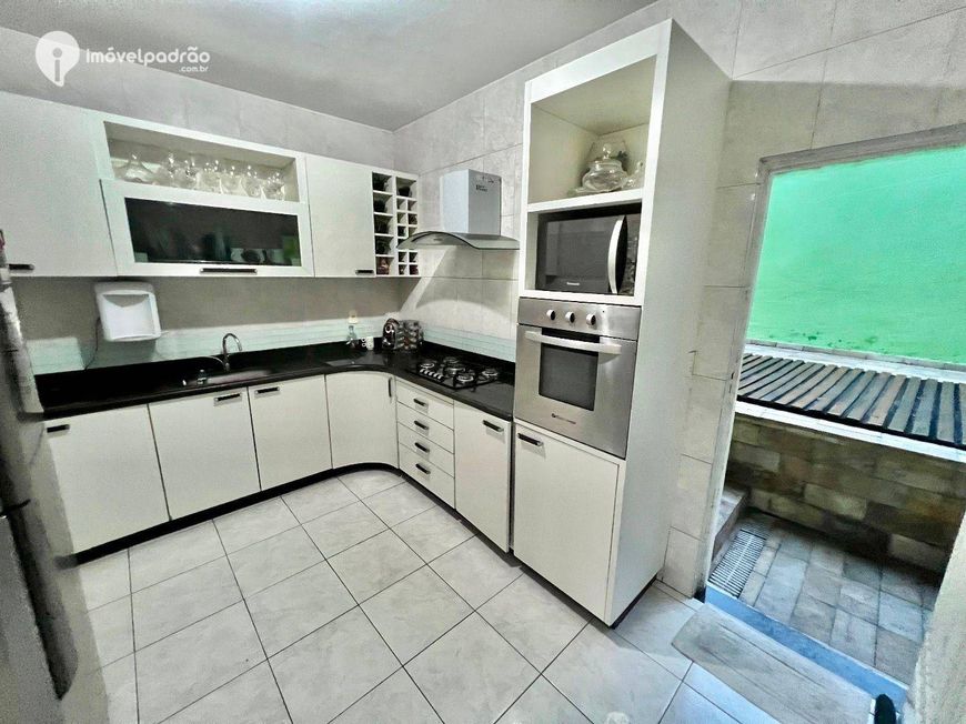 Casa com 3 dormitórios à venda, 180 m² por R$ 780.000,00 - Moqueta - Nova Iguaçu/RJ