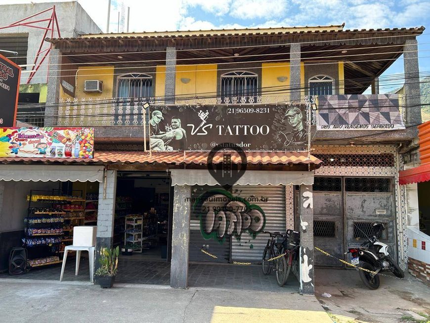 Casa em Área Comercial com 2 lojas