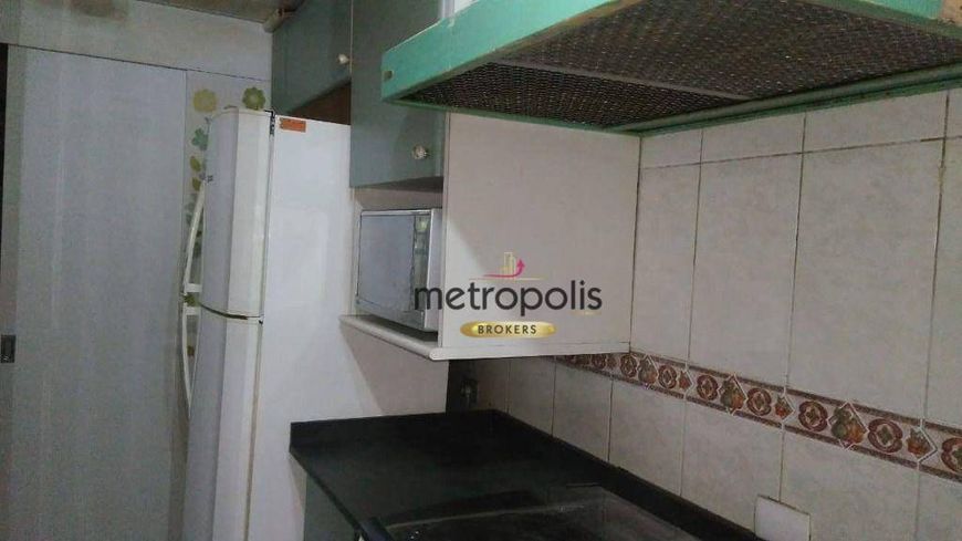 Sobrado, 90 m² - venda por R$ 664.000,00 ou aluguel por R$ 3.380,17/mês - Jardim Bela Vista - Santo