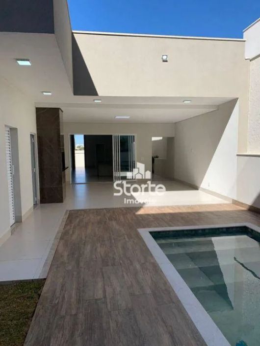 Casa alto padrão com 3 suítes à venda, 211 m² por R$ 1.390.000 - Cidade Jardim - Uberlândia/MG