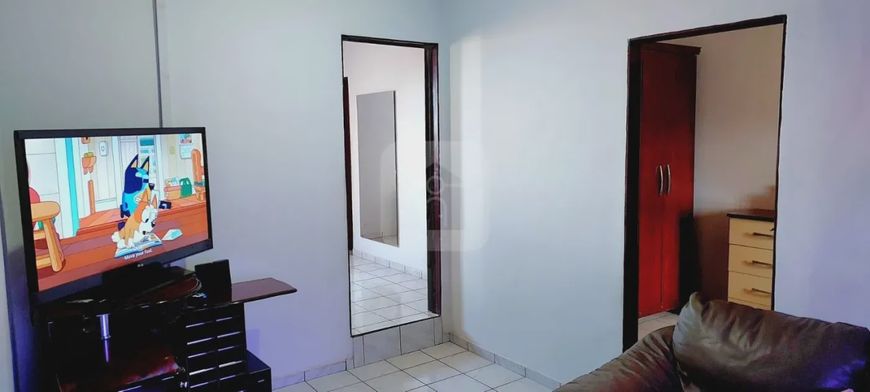 Sobrado com cômodo comercial para venda no bairro Morada da Colina.