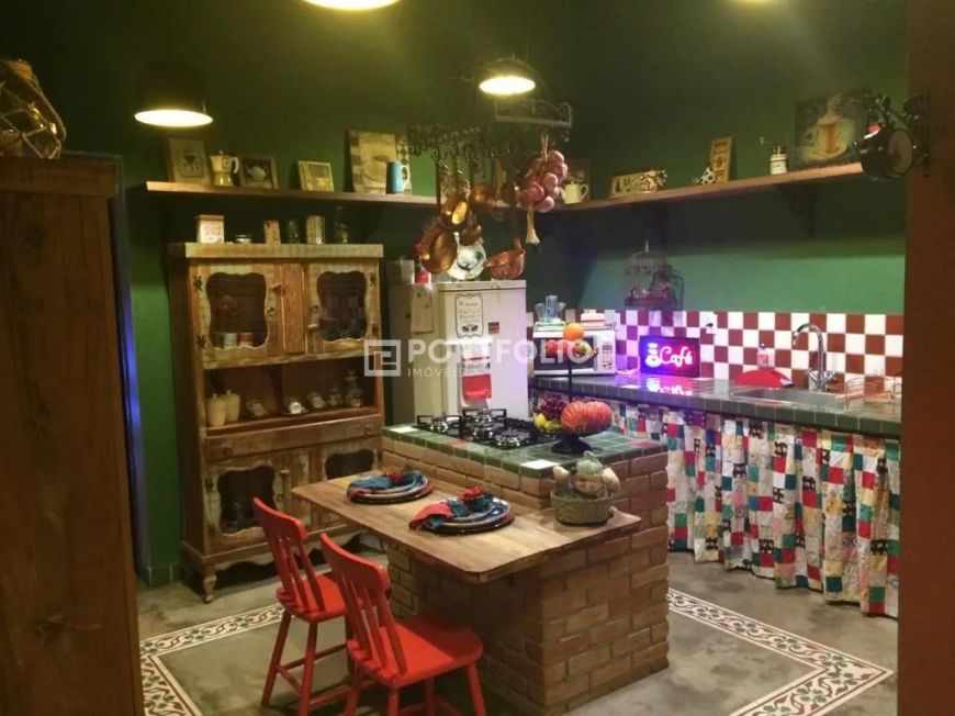 Casa com 3 dormitórios à venda, 130 m² por R$ 710.000,00 - Vila Santos Dumont - Aparecida de Goiânia