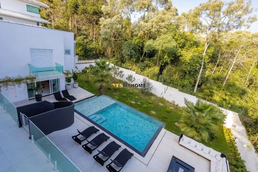 CASA EM CONDOMÍNIO COM 5 SUITES 8 VAGAS - MOBILIADA - CA9180