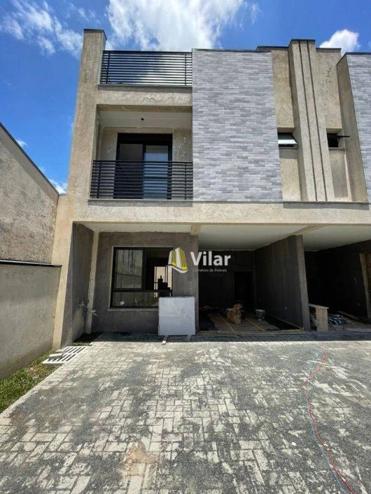 Sobrado com 3 dormitórios à venda, 127 m² por R$ 769.000 - Uberaba - Curitiba/PR