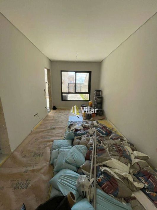 Sobrado com 3 dormitórios à venda, 127 m² por R$ 769.000 - Uberaba - Curitiba/PR
