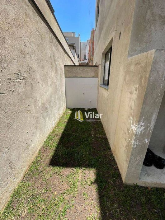 Sobrado com 3 dormitórios à venda, 127 m² por R$ 769.000 - Uberaba - Curitiba/PR