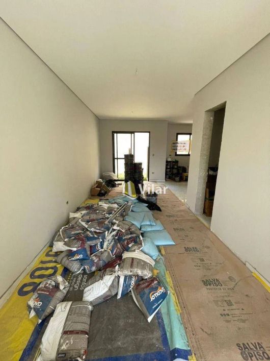 Sobrado com 3 dormitórios à venda, 127 m² por R$ 769.000 - Uberaba - Curitiba/PR