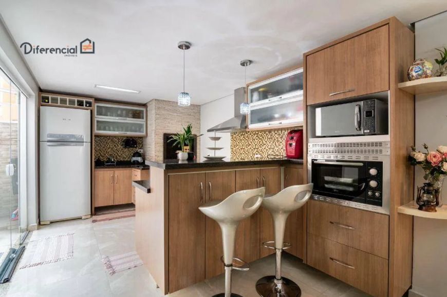 Sobrado com 4 dormitórios à venda, 121 m² por R$ 890.000,00 - Uberaba - Curitiba/PR