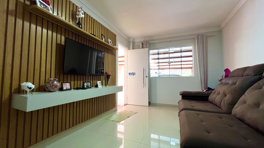 **"Casa com Área de Churrasqueira e Suíte com Sacada: O Lar Ideal para Sua Família!"**