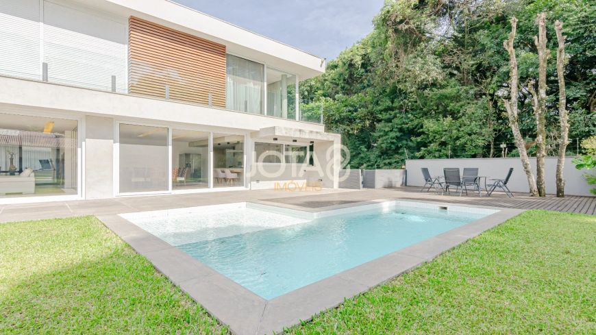CASA COM 4 SUÍTES E AMPLO TERRENO NO PORTAL DO BARIGUY Casa com 4 suites e piscina no Portal do Bari