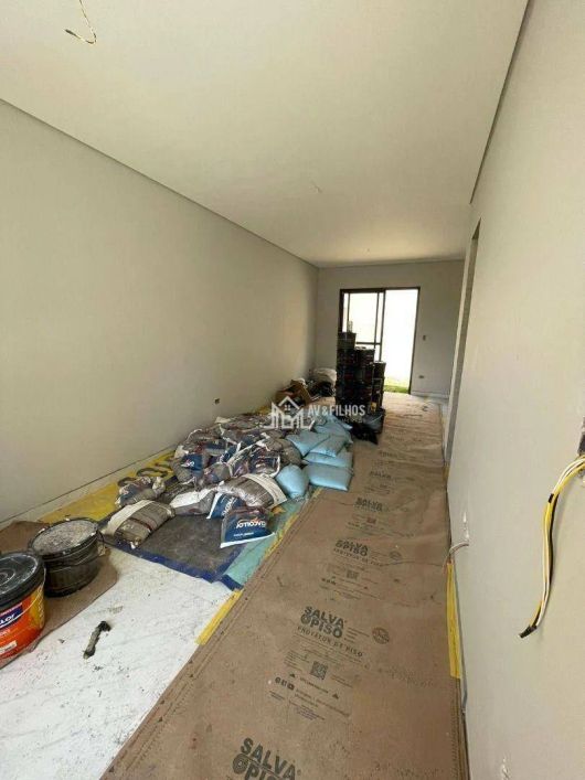 Sobrado com 3 dormitórios à venda, 127 m² por R$ 699.000,00 - Uberaba - Curitiba/PR