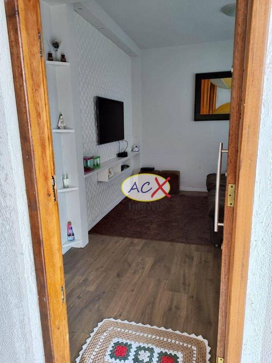 Sobrado com 3 dormitórios à venda, 128 m² por R$ 550.000,00 - Uberaba - Curitiba/PR