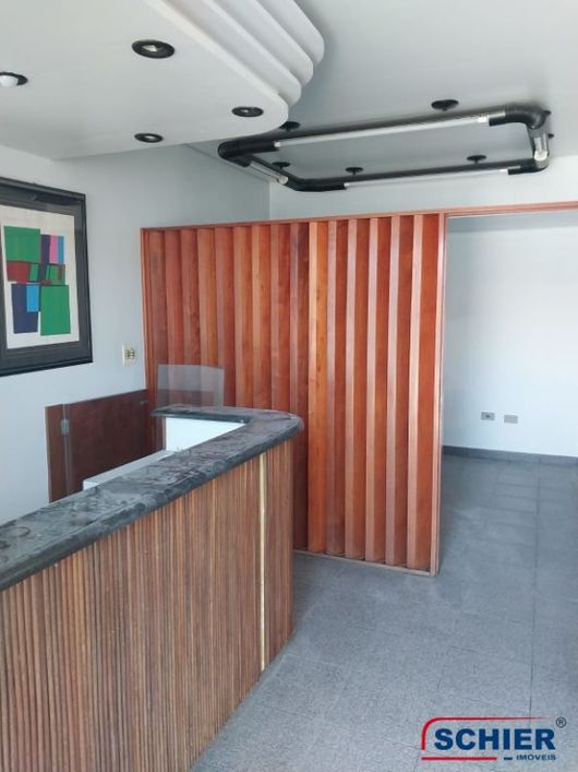 Loja térrea 80m² com 4 vagas no Novo Mundo - Curitiba-PR