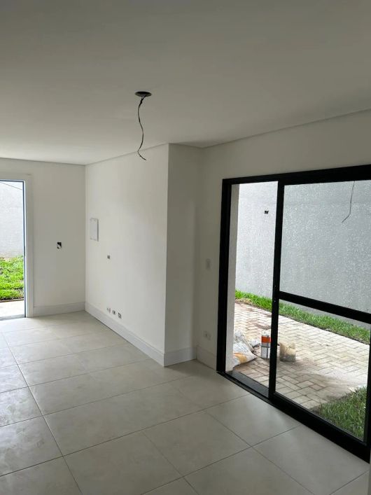 Sobrado para venda possui 119 metros quadrados com 3 quartos no bairro Xaxim