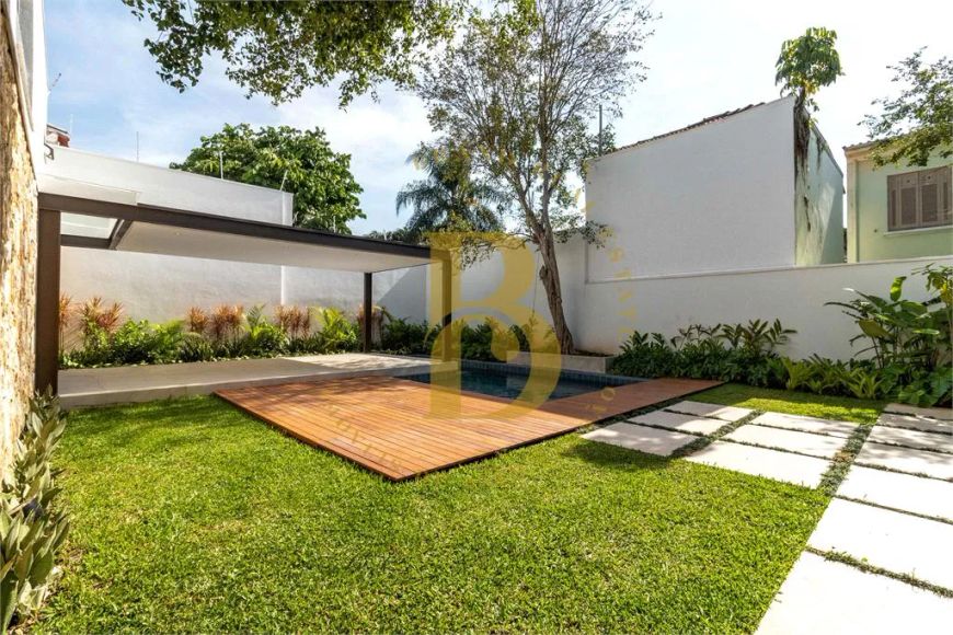 Casa com 410 m², 5 quartos sendo 5 suítes à venda no bairro Jardim Paulista.